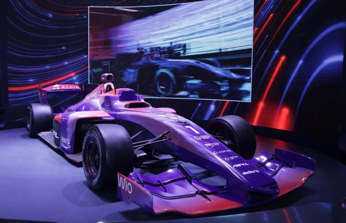 A2RL race car in a neon-lit digital racing environment