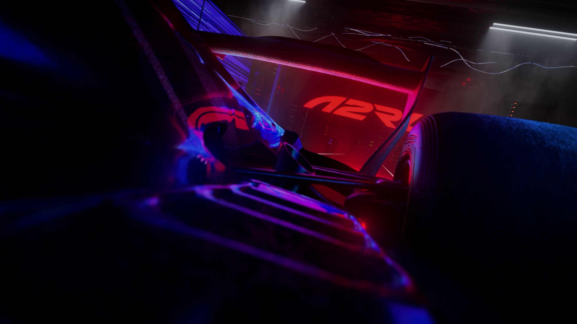 Close-up of an A2RL race car rear wing under red and blue light