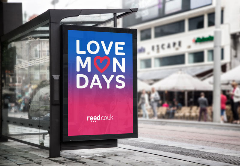 Love Mondays poster applied to a bus shelter